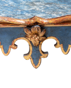 Consola azul y dorada en madera tallada. Italia. Siglo XVIII
