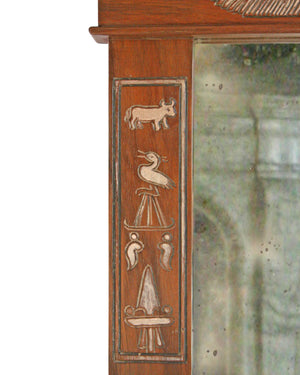 Pareja de espejos con marco de madera tallada con representaciones egipcias (Egiptomanía)