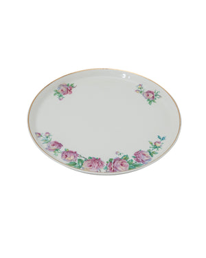 Juego de seis “cremiers” de porcelana con motivos de flores con plato