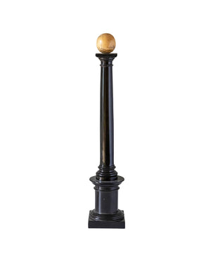 Ivory ball on column made of carved ebony wood