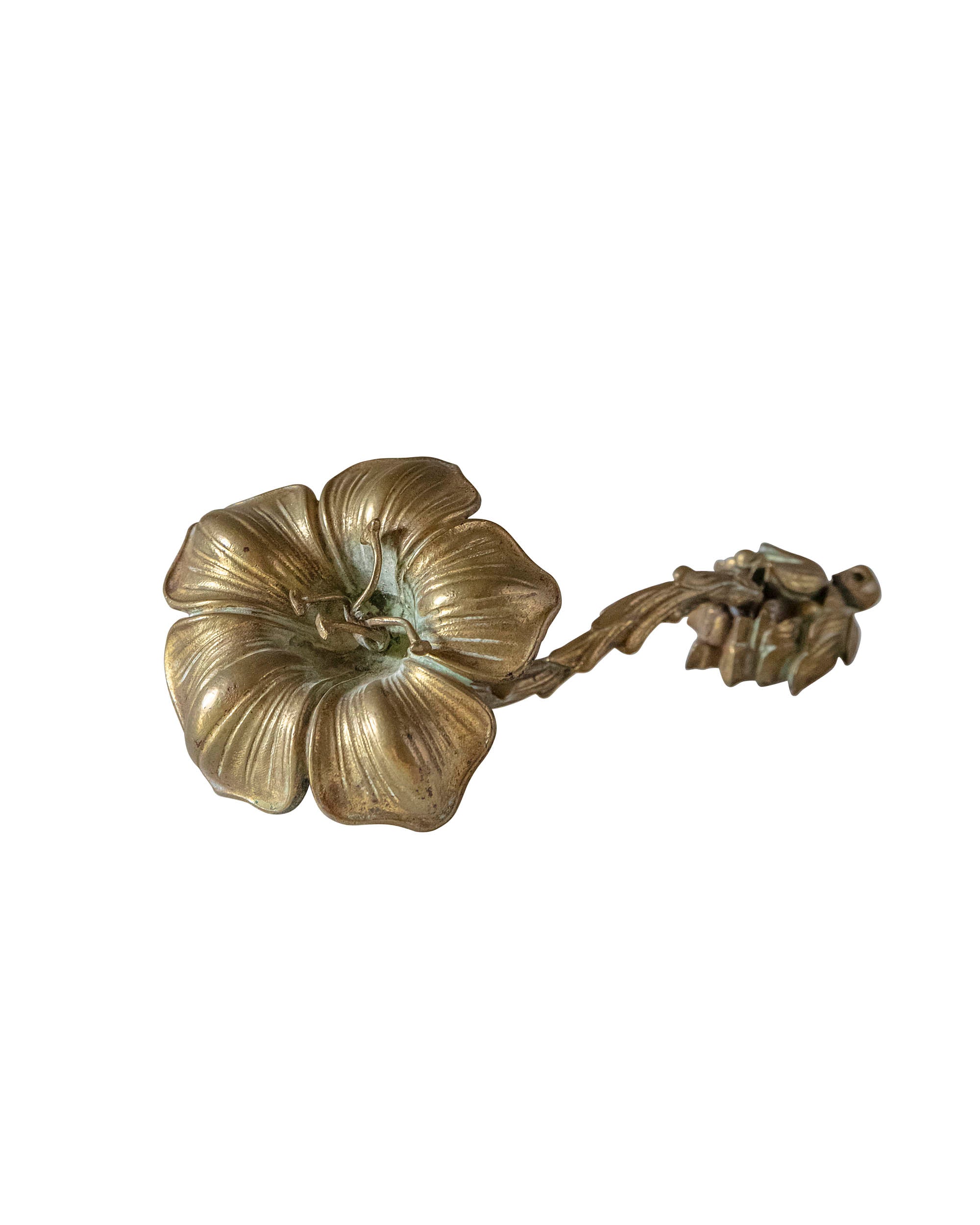 Golden bronze in the shape of a flower