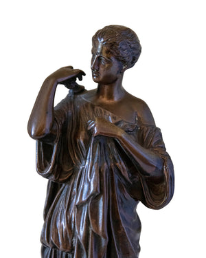 Bronze of a woman wearing a tunic