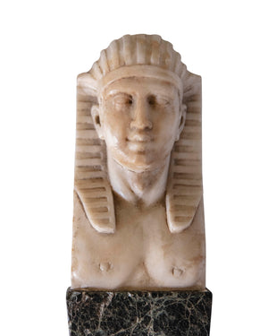Pair of Egyptian ivory sphinxes on carved marble plinth