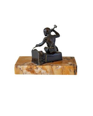 Bronze representing a young sculptor on marble plinth