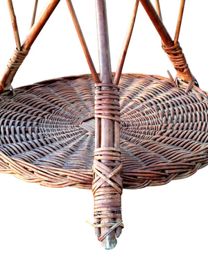 Circular wicker table with three levels