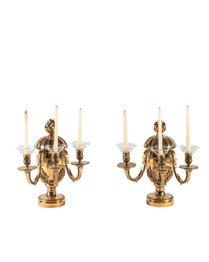 Pair of candelabra with three candle holders in golden bronze