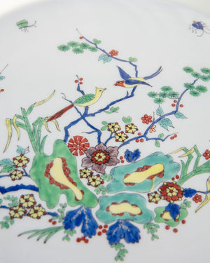 Fuente redonda de porcelana de Limoges con decoración de pájaros e insectos. Francia
