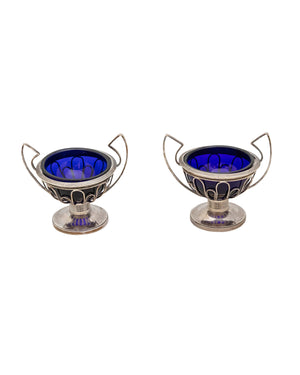 Pair of salt shakers made up of blue glass verrines mounted on a silver stand (Veilleard)