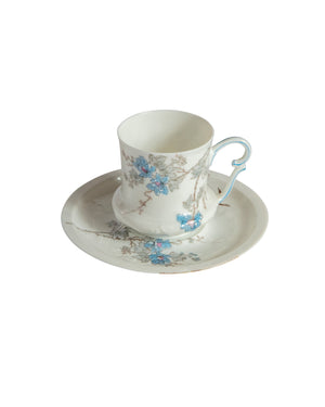 Porcelain coffee set with floral motifs and birds