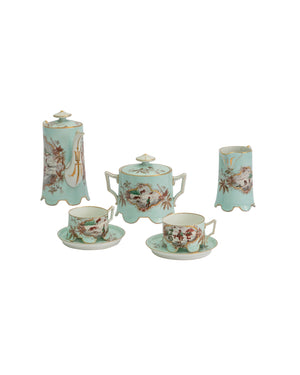 Sky blue and gold Art Nouveau tea set, with wavy finish and representations of various scenes