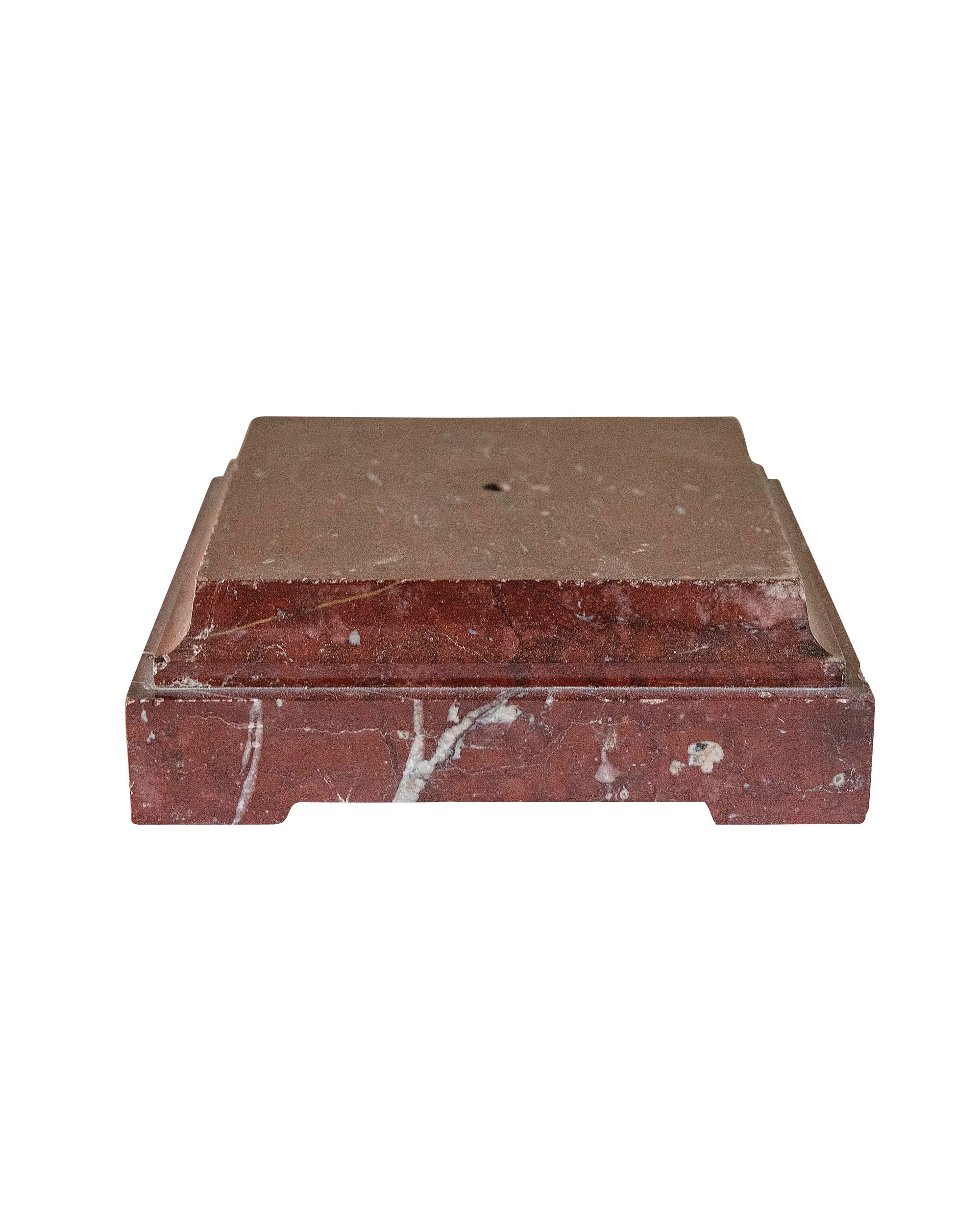 Square plinth carved in red marble 