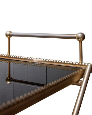 Brass and black glass trolley. 1960