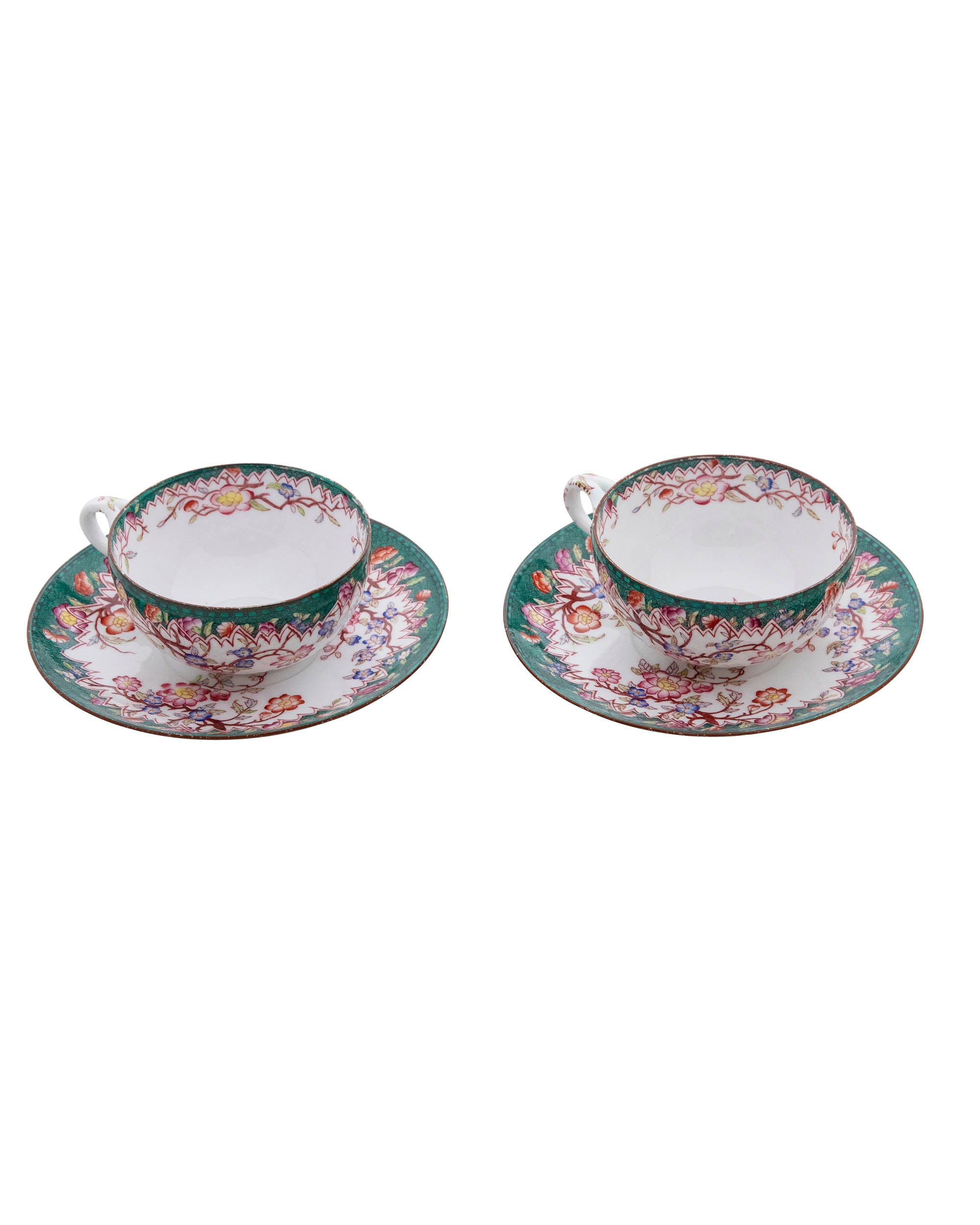 Service à thé en porcelaine à motifs floraux. XIXème siècle