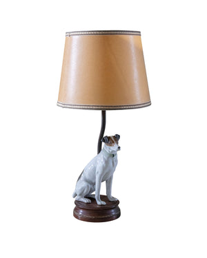Paire de lampes en porcelaine "chien et oiseau" sur socle en bois