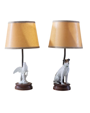 Pair of porcelain lamps "dog and bird" on wooden base