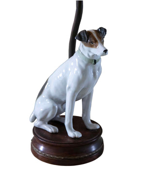 Paire de lampes en porcelaine "chien et oiseau" sur socle en bois
