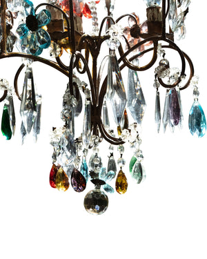 Chandelier with golden structure and crystal flowers in various colors